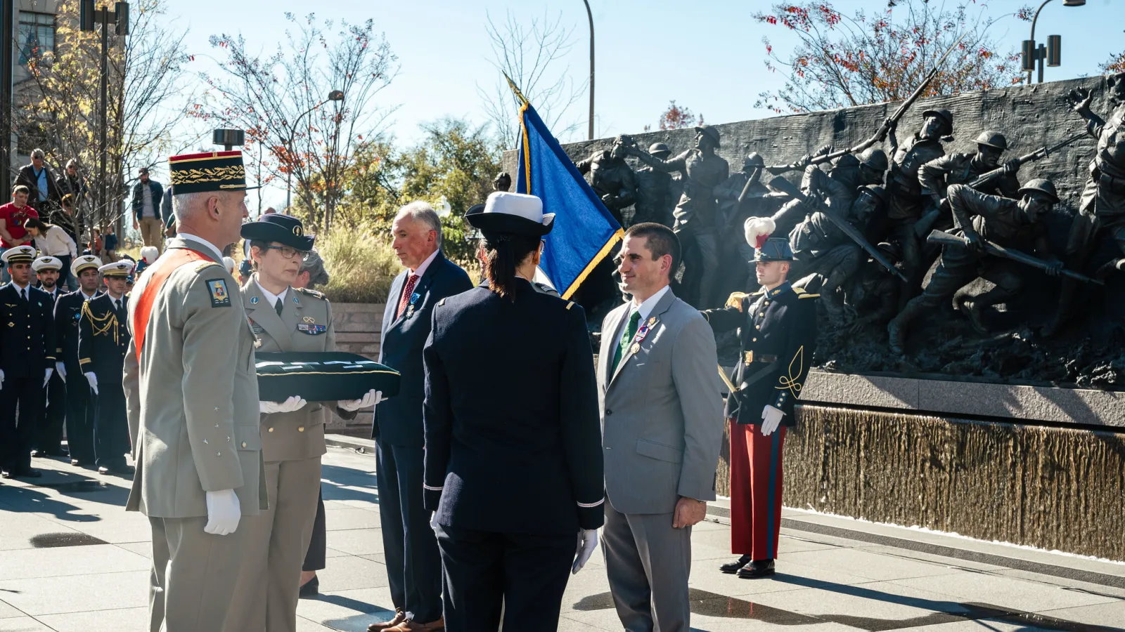 Blazich receiving the award from  French General Francois Lecointre while soldiers look on